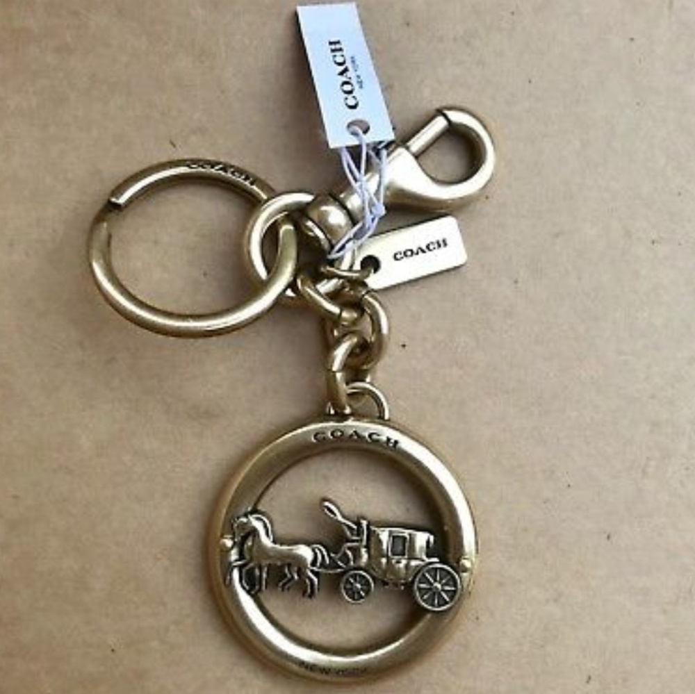 Coach Horse and Carriage Gold Tone Bag Charm.